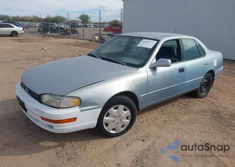 1993 Toyota Camry Le z USA, uszkodzony, nr VIN 4T1VK12E5PU098942